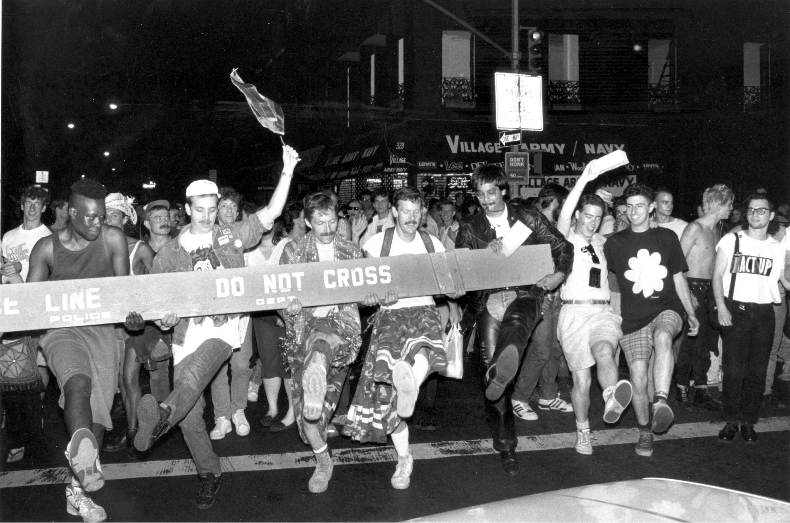 Kickline underneath police barricade, 1988
