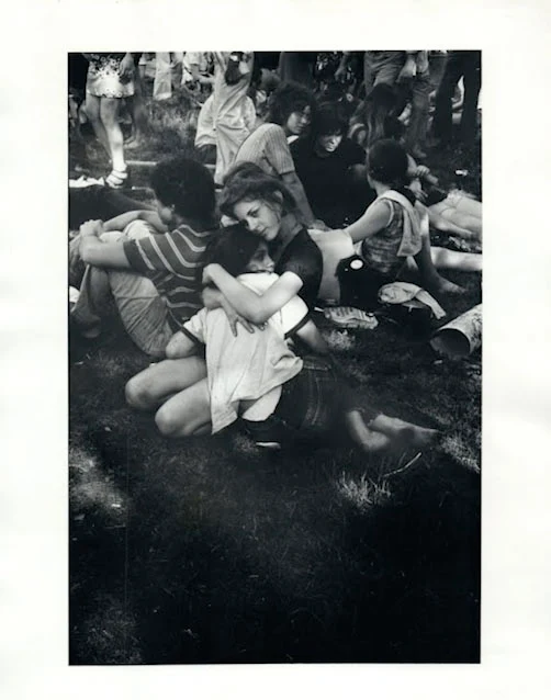Marchers hugging in Central Park during the Christopher Street Liberation Day March, 1971