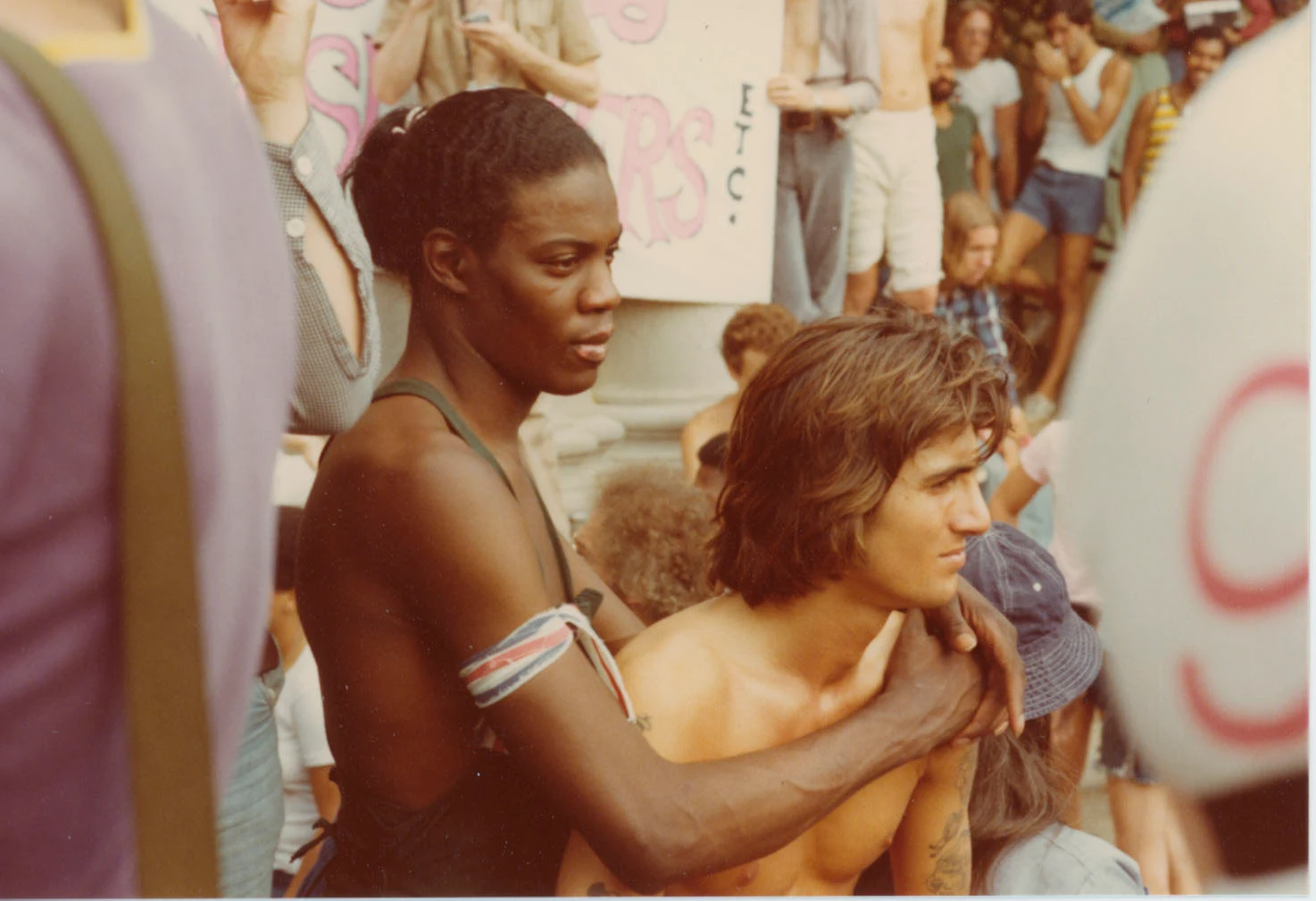 Men holding each other, 1976